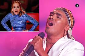 A singer named Seann stood