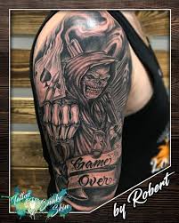 Classic cowboy skull tattoo design. The Dark Reaper Led The Cowboy Ahead Tattoo Snake Skin Facebook