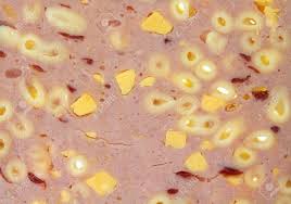 Macaroni and cheese—also called mac 'n' cheese in the united states, and macaroni cheese in the united kingdom —is a dish of cooked macaroni pasta and a cheese sauce, most commonly cheddar. A Very Close View Of A Slice Of Macaroni And Cheese Luncheon Meat Stock Photo Picture And Royalty Free Image Image 10709548