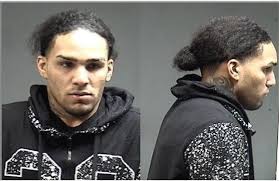 Man and 14-year-old arrested in armed robbery