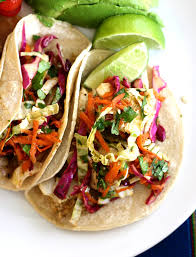 For slaw, whisk up tequila, lime juice, vinegar, honey or agave or sugar, oil, salt, pepper and celery seed. Recipe Fish Tacos With Cilantro Lime Slaw Victoria Mcginley Studio