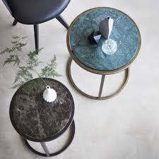 It's a place to eat, prop your feet up, or play your favorite game. Essential Guide To Cocktail Tables Tom Faulkner Designer Furniture