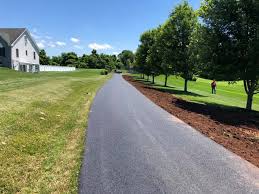 After repairing the concrete cracks with epoxy, apply a layer of cement stucco to the driveway. Driveway Repairs Repairing A Driveway The Full Steps 2020
