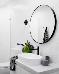 Large Round Mirror And Sconce Round Mirror Bathroom Bathroom Trends Bathroom Interior Design