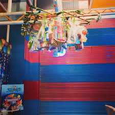 Pabitin Hanging Toys Game This Is A Traditional Game Originated From The Philippines Toys Are Attached To The Bamboo Us Zombie Birthday Birthday Diy Crafts