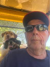 An old pontoon boat makes a perfect dock