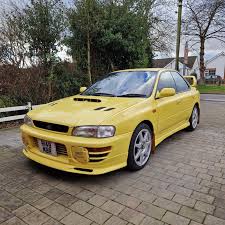 Image result for Herald Yellow 1975 Subaru