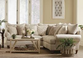 To spice up the sofas, add nice accent pillows in the hues of the wall color (so green pillows if green walls) and spice up the coffee table with something green, even a book with green cover would do. Living Room With Beige Couch Novocom Top