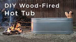 To start building this, make a heat exchanger inside of the metal garbage bin. Diy Wood Fired Hot Tub Youtube