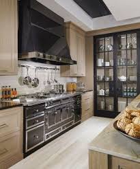 Open shelving creates an effortless, casual ambiance in the kitchen and keeps essentials within easy reach. High End Kitchen Finishes Luxury Kitchen Design Ideas Custom Kitchen Remodel Best Kitchen Designs Interior Design Kitchen