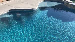 For more glass beads & pebble pool finishes, visit nptpool.com Stonescapes Aqua Blue Pebble Sheen Youtube