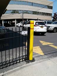Commercial Parking Lot Aluminum Fence And Bumper Post With Bollard Cover Installed In Valley Stream Ny By Liberty Fen Gates And Railings Aluminum Fence Fence