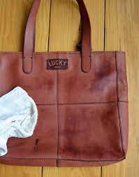 Removing Water Stains On Leather Preservation Solutions Clean Leather Purse Soft Leather Purse Leather Bag Cleaning