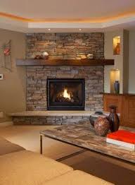 Prin colaborarea cu echipele noastre de amenajari interioare obtineti lucrari de calitate deosebita si garantia lucrului bine facut. Placare Cu Piatra Naturala La Interior Preturi Manopera Amenajari Interioare Corner Fireplace Living Room Corner Stone Fireplace Home Fireplace