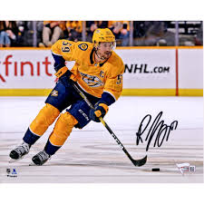 Sir how is this possible?? Roman Josi Nashville Predators Autographed 8 X 10 Gold Jersey Skating Photograph