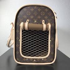 Colorful dog carrier also features breathable mesh alongside the front. Louis Vuitton Dog Carrier 40 Monogram Canvas M42024 M42024 264 00 Ioffer Designer Replica Louis Vuitton Handbag Wallet Accessories High Quality