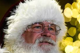 Community members gather in downtown Greenville for annual tree lighting