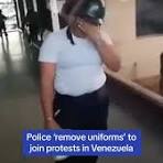 Police officers in Venezuela 'remove their uniforms, in a ...