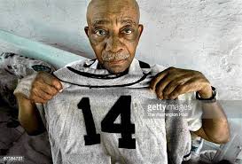 89-year-old Walter "Buddy" Williams shows his playing jersey from... News  Photo