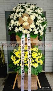 Fill this summer with flowers! Two Layer Standing Arrangement Of White Yellow Mums Sympathy Funeral Flowers Flower Patch Online Flower Delivery Phillippines