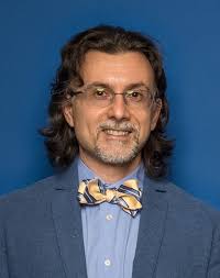Professor Marco Caricato named July 2024 Sutton Family Research Impact  Award recipient