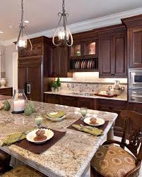 A Kitchen With A Large Island And A Plate Rack Over The Sink Traditional Kitchen Interior Design Kitchen Kitchen Interior