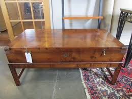 You might even want to style it like you would a work of art. Campaign Style Lift Top Coffee Table With Brass Detail From Sarah Cyrus Home Of Atlanta Ga Attic