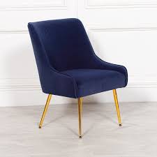 I bought four for a fun seating area next to our kitchen! Aurelie Navy Blue Velvet Dining Chair With Gold Legs Furniture La Maison Chic Luxury Interiors