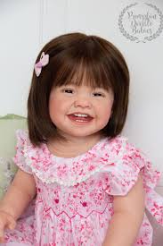 Available! Mila by Ping Lau. Very cute girl but could also be a boy with a  haircut (last 2 photos). I'll let buyer decide ♥  https://www.etsy.com/listing/764145194/ready-to-ship-reborn-toddler-doll-baby?ref=shop_home_active_1&frs=1