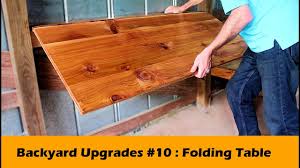 You can follow step by step on the video. Simple Fold Down Table Bar Diy Backyard Upgrades 10 Youtube