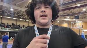 State Meet: Rogers' Kaden Thomas captures shot