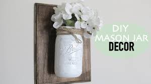 The 1/2 pint mason jar that forms the vessel on this sconce is held in place by a heavy leather strap that may be upcycled. Diy Mason Jar Decor Youtube
