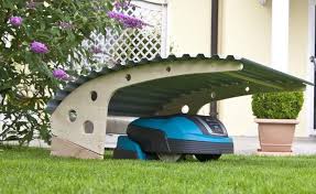 Un Garage Pour La Tondeuse Robotique Eine Garage Fur Den Mahroboter Bien Que La Tondeuse A Gazon N 039 Ait Pas Neces Amenagement Jardin Design Jardin Garage