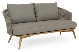 This sofa features a solid wood frame, sinuous spring seat construction, recessed arms, with a down feather blend seat and backfilling, and removable seat and back cushions. Bizzotto Homemotion Ninfa 0660479 Sofa With Seat And Legs In Teak Wood And Back Covered With Rope Vieffetrade