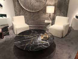 Arteriors denmark coffee table details coffee table with carved starburst radial motif on top and then clad in an antique brass sheet. Coffee Table Designs To Make Your Living Room Look Fabulous