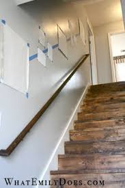 Floor to ceiling bookcase photo: Stairs Are Often The First Thing Guests See When They Enter Your Home And Adding A Splash Of Paint Can Turn Them Into A Home Stairway Decorating House Design