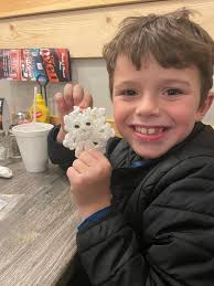 Hubby got me a Hallmark Christmas ornament. Uh oh no! It's a new baby! We  called him Kelly and I am crocheting an outfit for the tiny guy. He will  also need