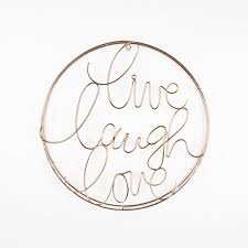 Her image color is pale blue. Live Laugh Love Metal Wall Art Grahambrownrow