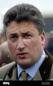 Trainer paul nicholls at cheltenham racecourse hi-res stock photography and  images