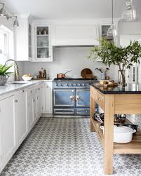 White Kitchen French Blue Stove Patterned Tile Floor Modern Farmhouse Kitchens Kitchen Design Small Kitchen Interior