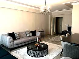 Salon Modern Chesterfield Gri Orta Sehpa Cam Orta Sehpa Hali Yuvarlak Sehpa Avize Salon Avizesi Kirlent Odam Mobilya Festiva Chesterfield Gri Modern