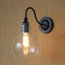 Nothing can provide your home with warmth, friendliness and drama like a wall sconce. American Rustic Sphere Wall Sconce One Light Clear Open Glass Wall Light In Black For Stair Takeluckhome Com