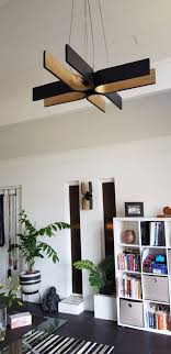 Black Gold Light Fixture With Natural Wood Texture Made Of Etsy Wooden Light Fixtures Black Wood Texture Wood Furniture Living Room