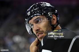 Dwight King of Los Angeles Kings adjusts his helmet as he warms up... News  Photo