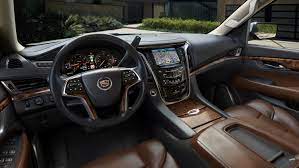 Color and trim manager michelle killen compares her approach to interior design: 2015 Escalade Elevates Interior Craftsmanship