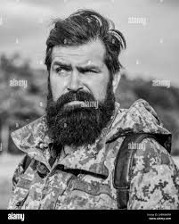 Brutal hunter man Black and White Stock Photos & Images