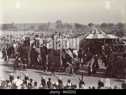 Crowd and procession of elephants at the Delhi Durbar event to celebrate Queen Victoria taking the title Empress of India. January 1st 1877. . The History of the Imperial Assemblage at Delhi.