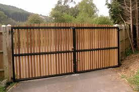 Would not swing 10' wood gates @ six foot height wooden gate on a six by six doug fir or southern pine treated. Driveway Gates Spectrum Fence