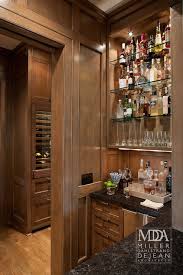 The wide counter space holds a grinder and an espresso machine while leaving space for serving brunch. Toffee Kitchen Cabinets Design Ideas