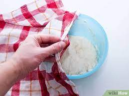 Put the dough in a greased bowl and cover with plastic wrap. 4 Ways To Make Dough Rise Faster Wikihow